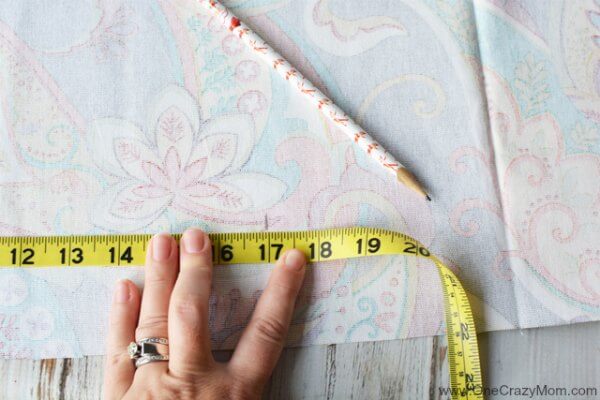 Tape measure on fabric.