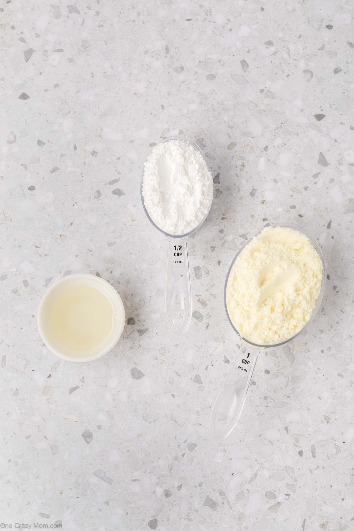 Ingredients - Powdered milk, powdered sugar, and melted coconut oil