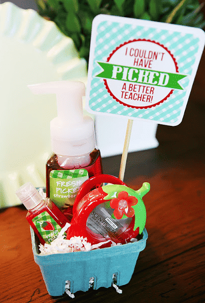 Berry container with bath and body works supplies.