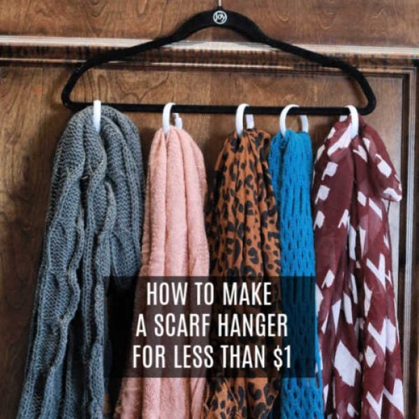 Scarves hanging on a rack.