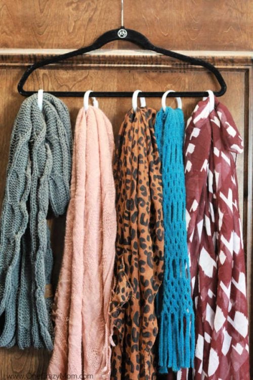 Scarves hanging together.