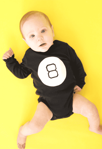 Baby in magic 8 ball costume.