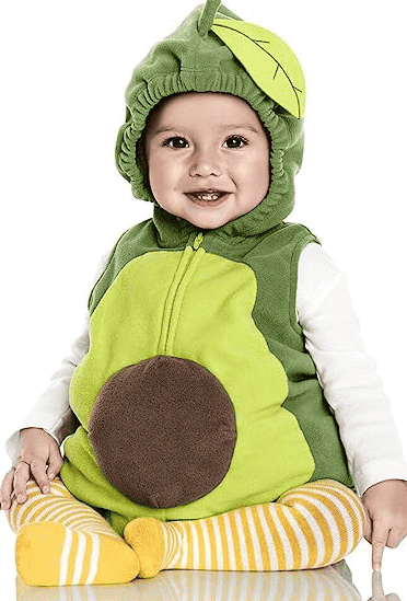 Child in avocado costume sitting up.