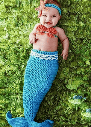 Mermaid costume on child.