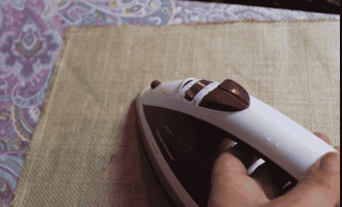 Ironing the placemats.