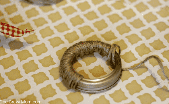 Twine wrapped around ring.