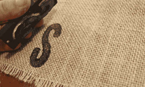 Stamping burlap.