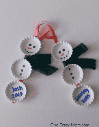 Bottle cap snowman ornaments ready to go on tree.