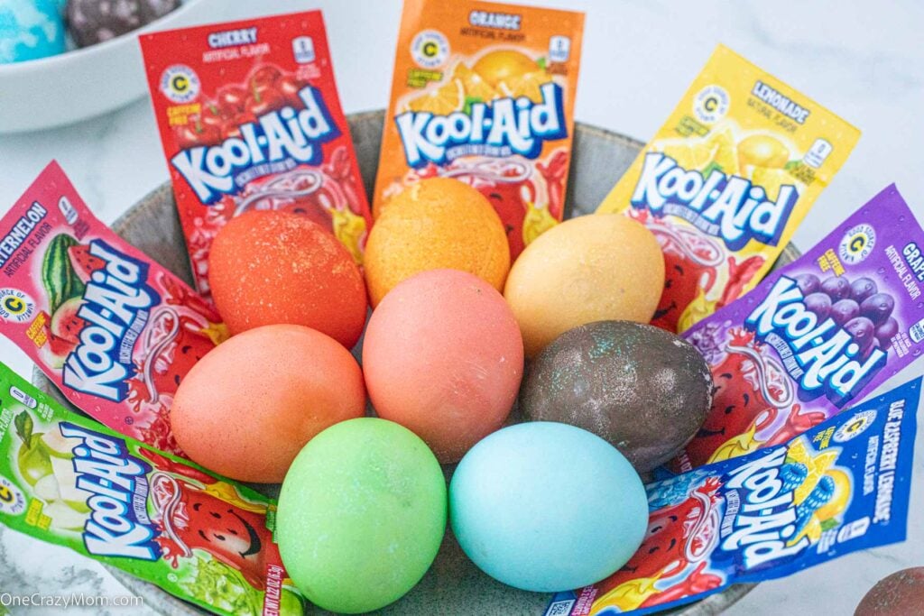 Kool Aid dyed eggs in a basket.
