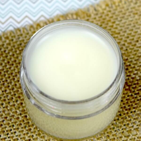 Lip balm in an open container.