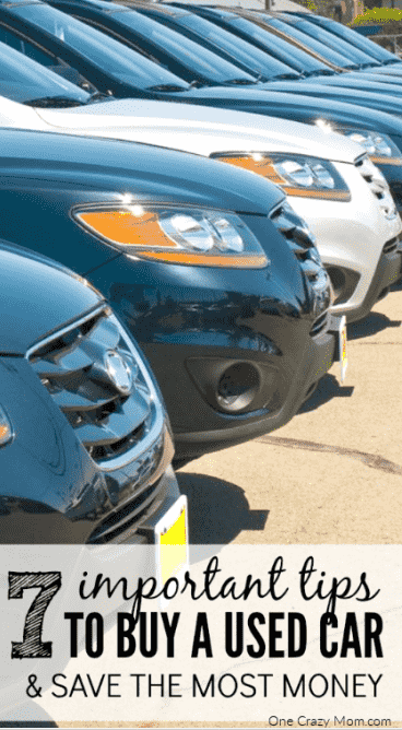 Cars lined up at car dealership.