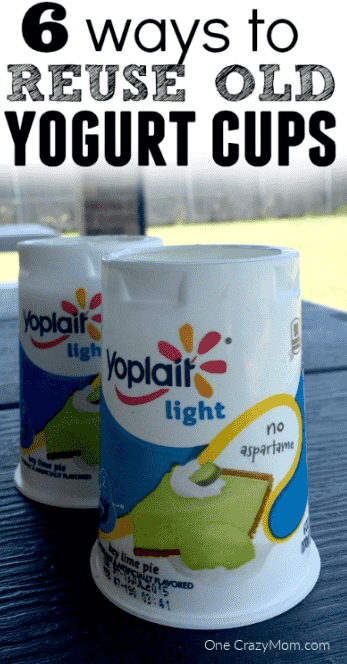 Yogurt cups on table.