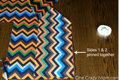Fabric folded and pinned.