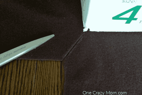 Fabric being cut.