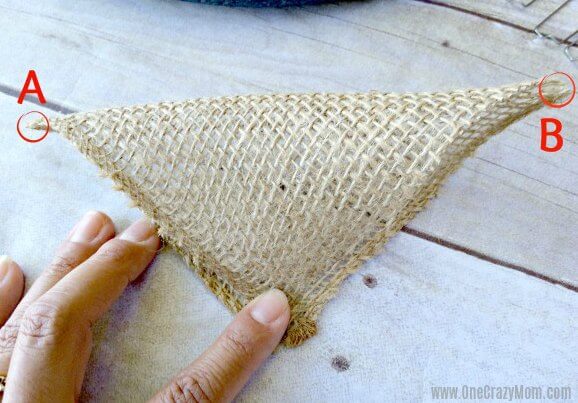 Burlap ribbon folded to the corner.