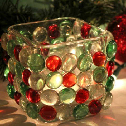 Glass candle holder with votive.