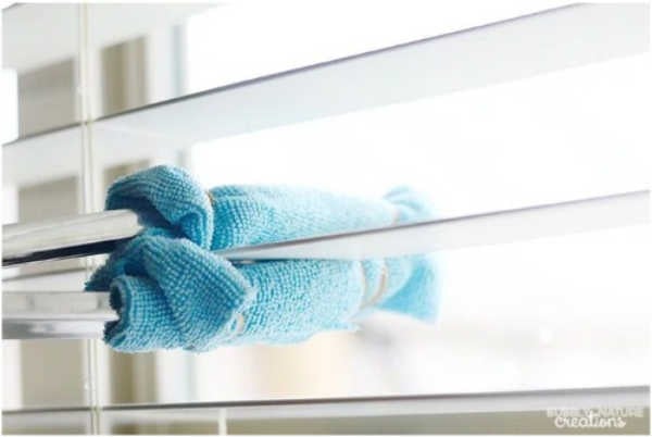 Do you need to clean your blinds but keep putting the task off? Learn how to clean blinds quickly and easily with these easy tips. Cleaning blinds with a cleaning wand.