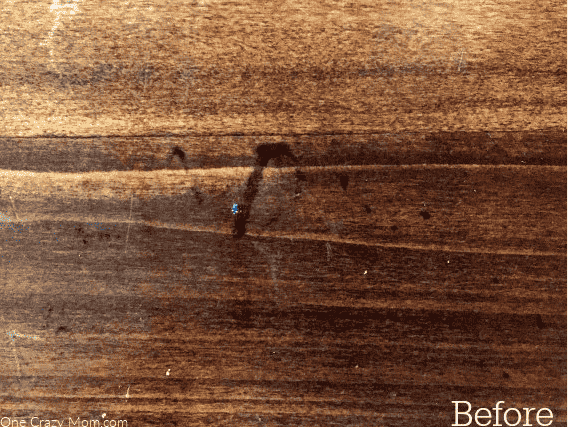 Table with permanent marker marks.