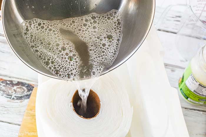 Pouring liquid in the paper towel hole