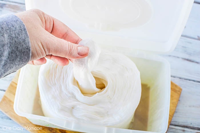 Pull the paper towel out by hand
