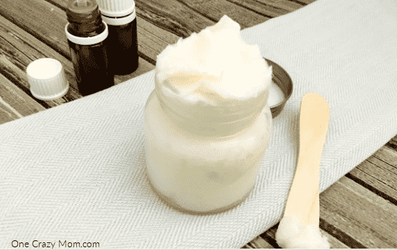 Lotion in jar with the top open.