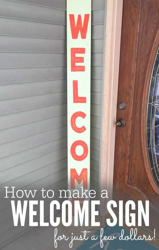 Welcome sign propped up by door.