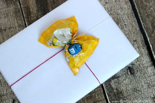 Box with candy bow.