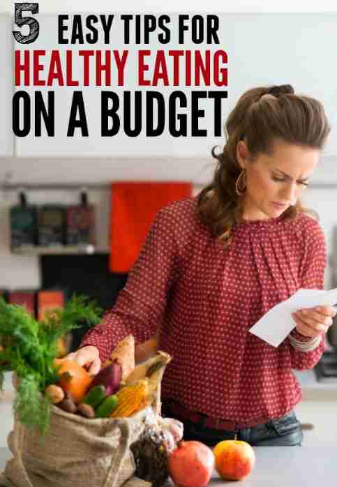 Woman with groceries and list.