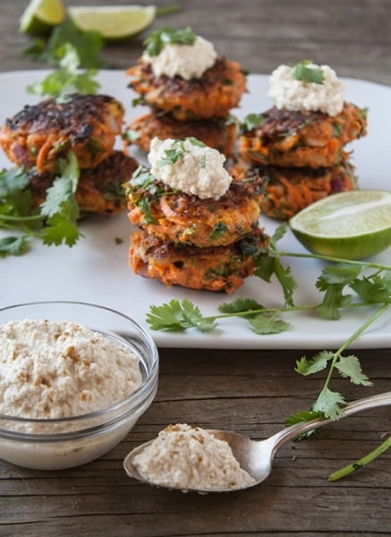 Find lots of healthy school lunch ideas here! 30 healthy back to school lunch ideas that are quick, easy and kid approved! Carrot fritters on a plate with limes.