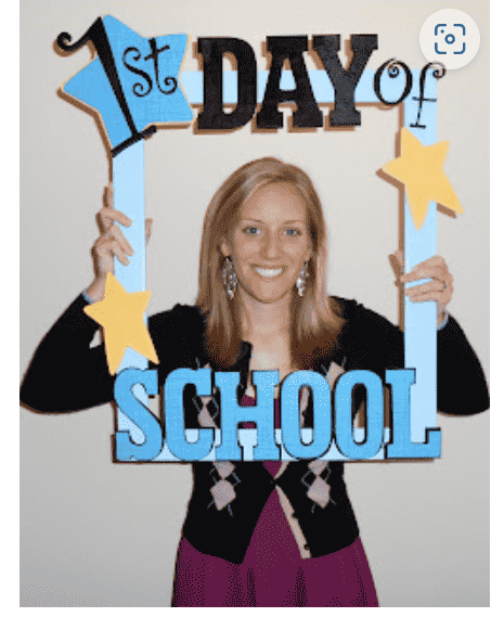 First day of school frame with a girl holding it.
