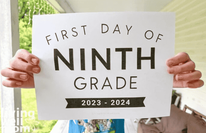 First day of school sign with grades.