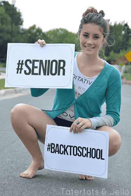 Hashtag sign being held by student.