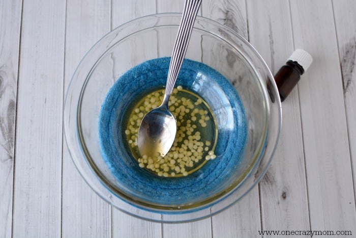 Find out how to make homemade hand cream. This easy homemade hand cream is perfect for dry skin. You only need a small amount of Homemade hand cream for dry hands to work. Try DIY hand cream today. Combining ingredients in a bowl.