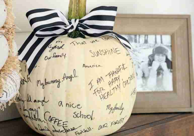 White pumpkin with a bow.