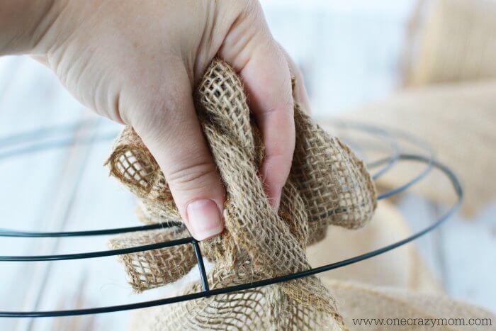 Burlap bunched together on wreath form.
