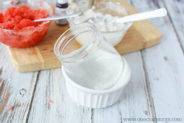 Glass jar tilted in a bowl.
