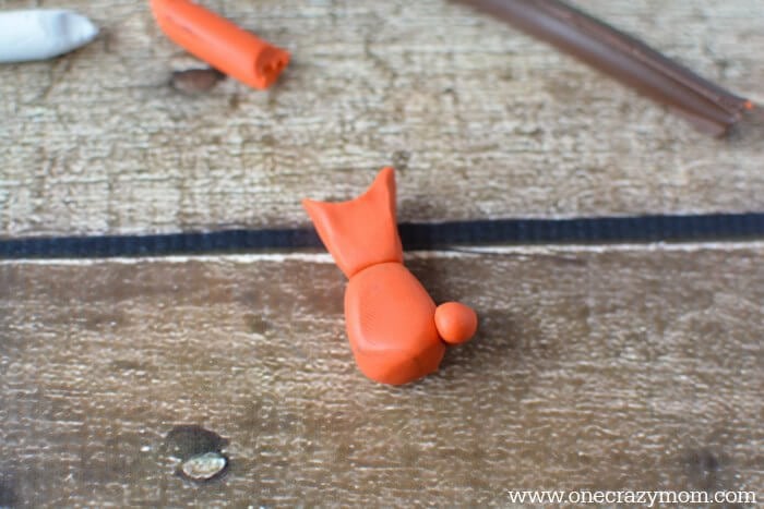 Fox put together with clay pieces.