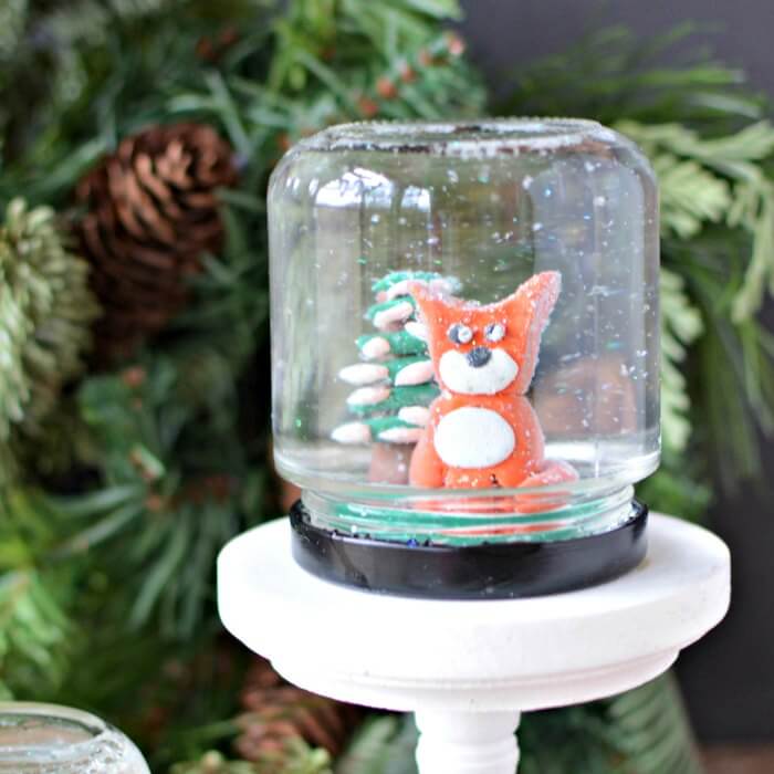 Snow globe on stand.