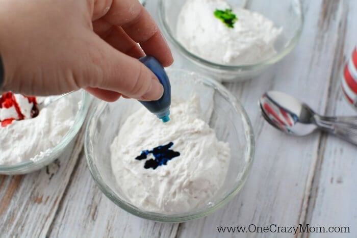Mixture divided into small bowls and food coloring added.