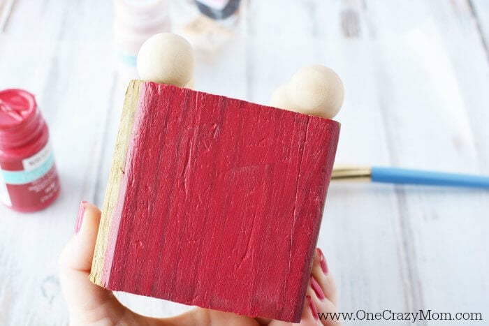 Wooden block painted red.