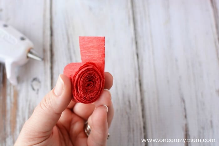 Crepe paper rolled together to form a flower.