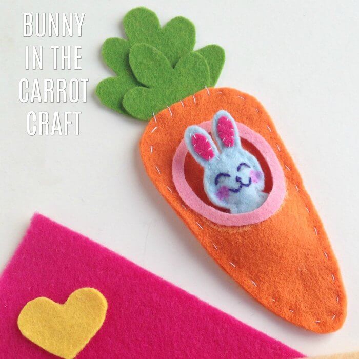 Felt carrot with bunny inside.
