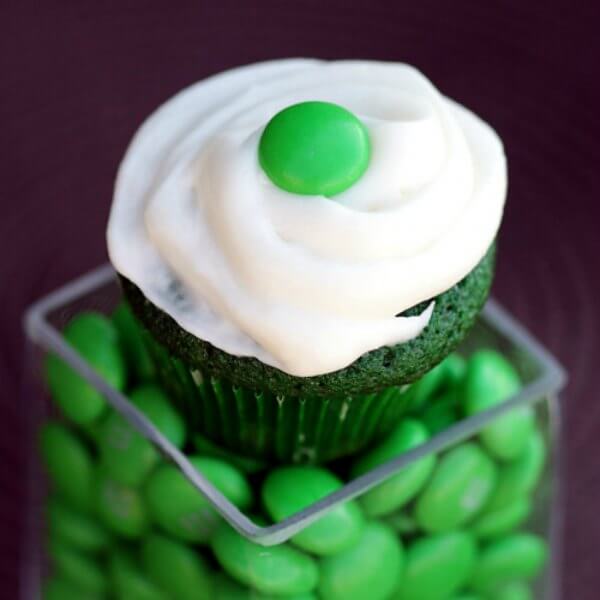 Everyone will love these fun St. Patrick's Day desserts. Find over 15 easy St Patrick's Day Desserts. Festive desserts and snack ideas sure to be a hit. Green velvet cupcakes on top of candy.