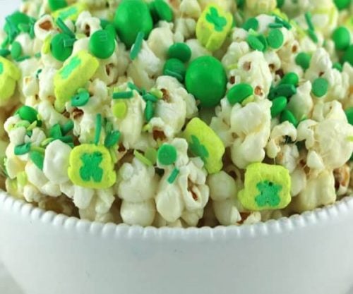 Everyone will love these fun St. Patrick's Day desserts. Find over 15 easy St Patrick's Day Desserts. Festive desserts and snack ideas sure to be a hit. Leprechaun Popcorn in bowl.