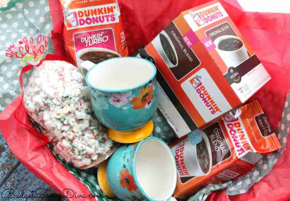Coffee basket with mugs, coffee and treats.