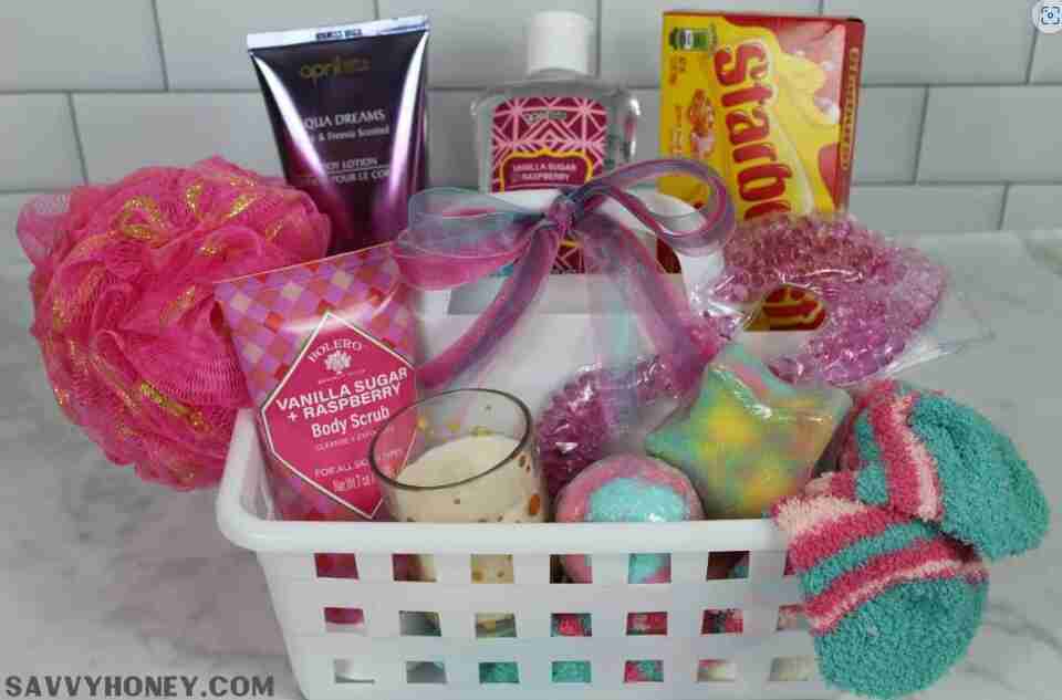 Spa set with candy, socks, bat bombs and more in a basket.