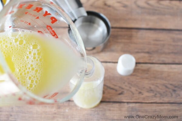 Mixture poured into bottle.