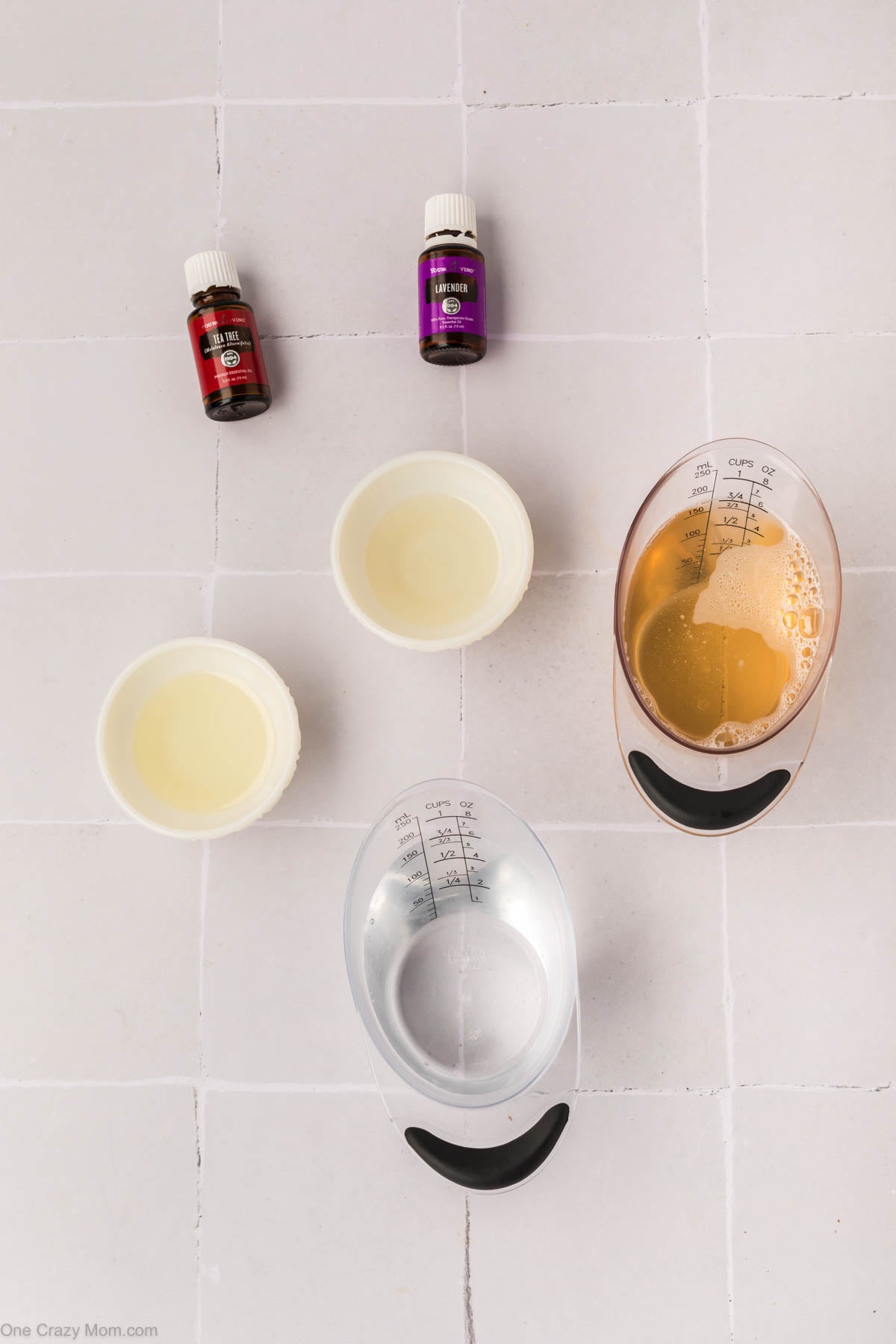 Supplies for hand soap - castile soap, vitamin e oil, sweet almond oil, tea tree oil, lavender oil.