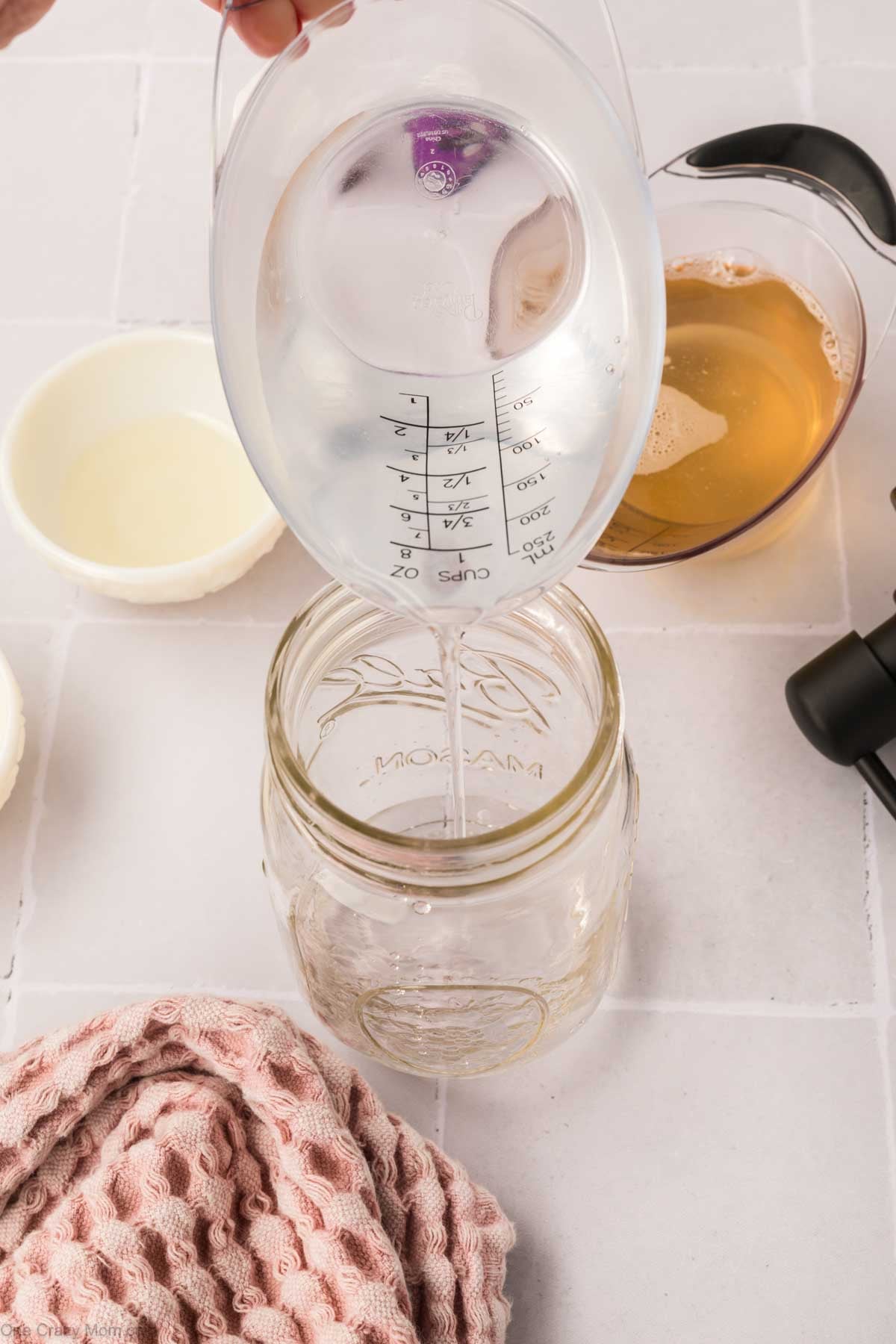 Water poured into mason jar.