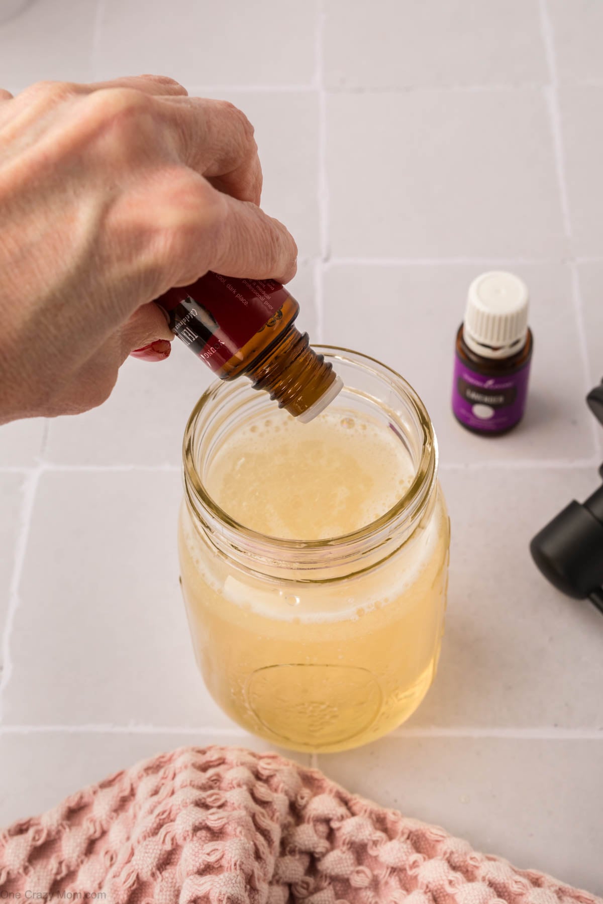 Essential oils added to jar.